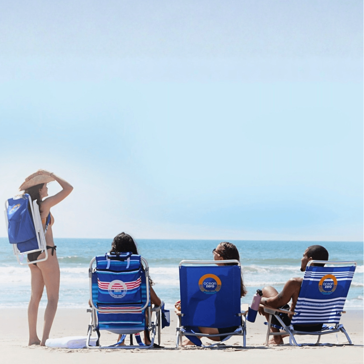 Ocean Zero beach chair with adjustable canopy on the beach